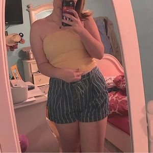 Blue and white striped jean shorts with tie belt